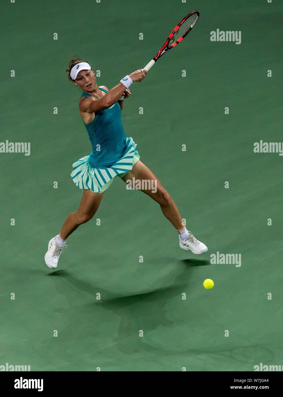 Samantha Stosur of Australia returns a shot to Han Xinyun of China in their first round match during the WTA Guangzhou International Women's Open 2017 Stock Photo