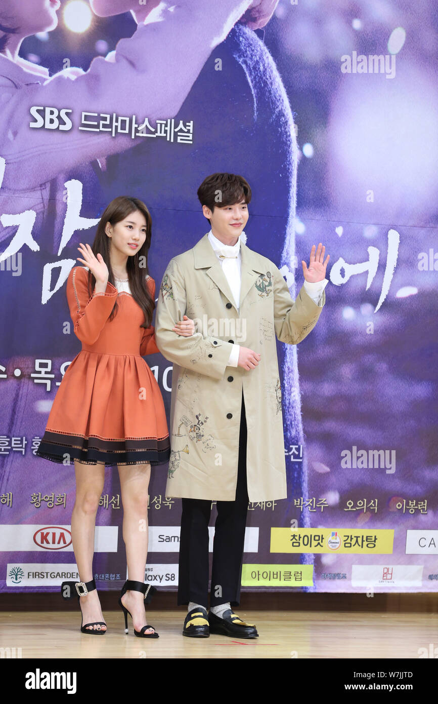 South Korean actress Bae Su-ji, left, better known as Suzy, and actor Lee Jong-suk attend a press conference for their new TV drama 'While You Were Sl Stock Photo