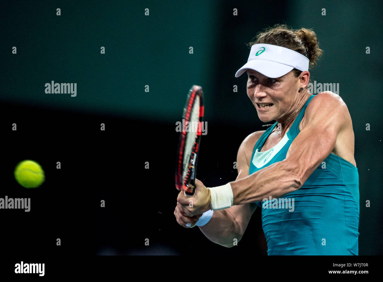 Samantha Stosur of Australia returns a shot to Han Xinyun of China in their first round match during the WTA Guangzhou International Women's Open 2017 Stock Photo