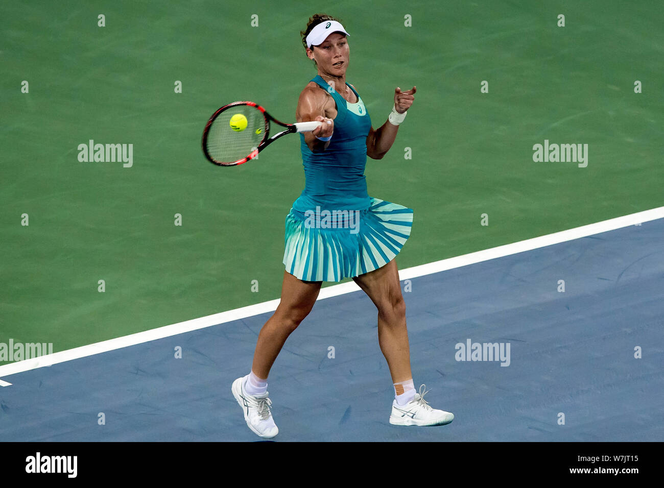 Samantha Stosur of Australia returns a shot to Han Xinyun of China in their first round match during the WTA Guangzhou International Women's Open 2017 Stock Photo