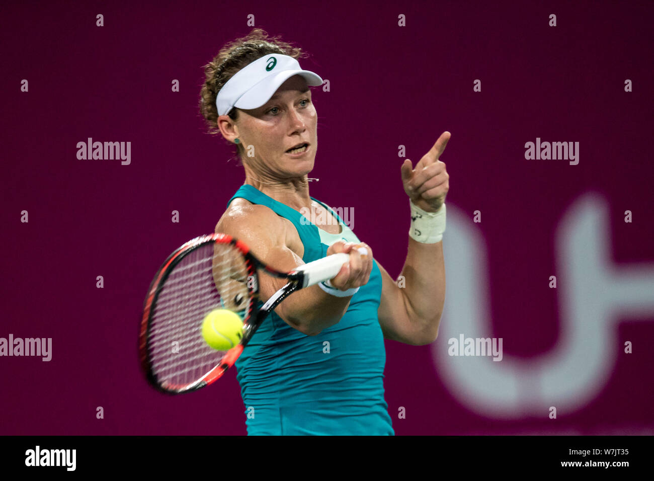 Samantha Stosur of Australia returns a shot to Han Xinyun of China in their first round match during the WTA Guangzhou International Women's Open 2017 Stock Photo