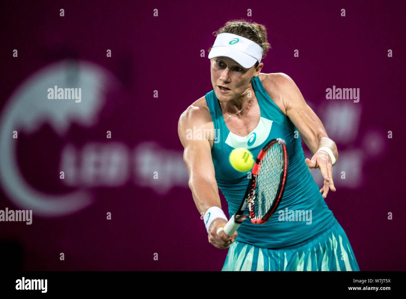 Samantha Stosur of Australia returns a shot to Han Xinyun of China in their first round match during the WTA Guangzhou International Women's Open 2017 Stock Photo