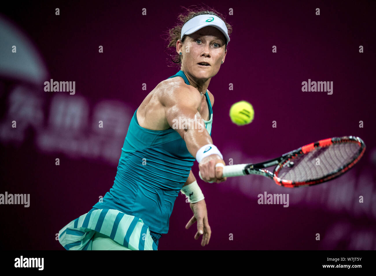 Samantha Stosur of Australia returns a shot to Han Xinyun of China in their first round match during the WTA Guangzhou International Women's Open 2017 Stock Photo