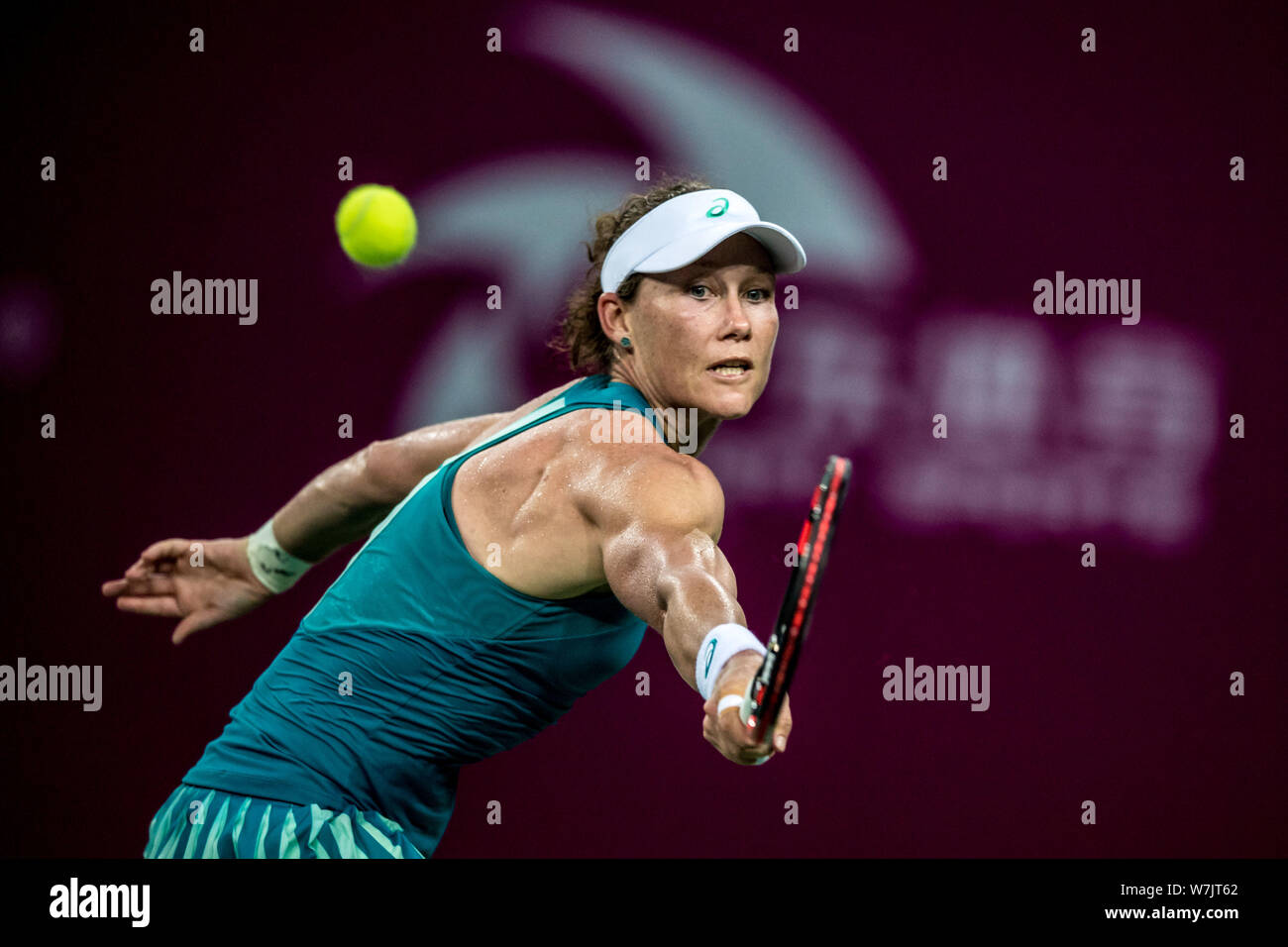 Samantha Stosur of Australia returns a shot to Han Xinyun of China in their first round match during the WTA Guangzhou International Women's Open 2017 Stock Photo