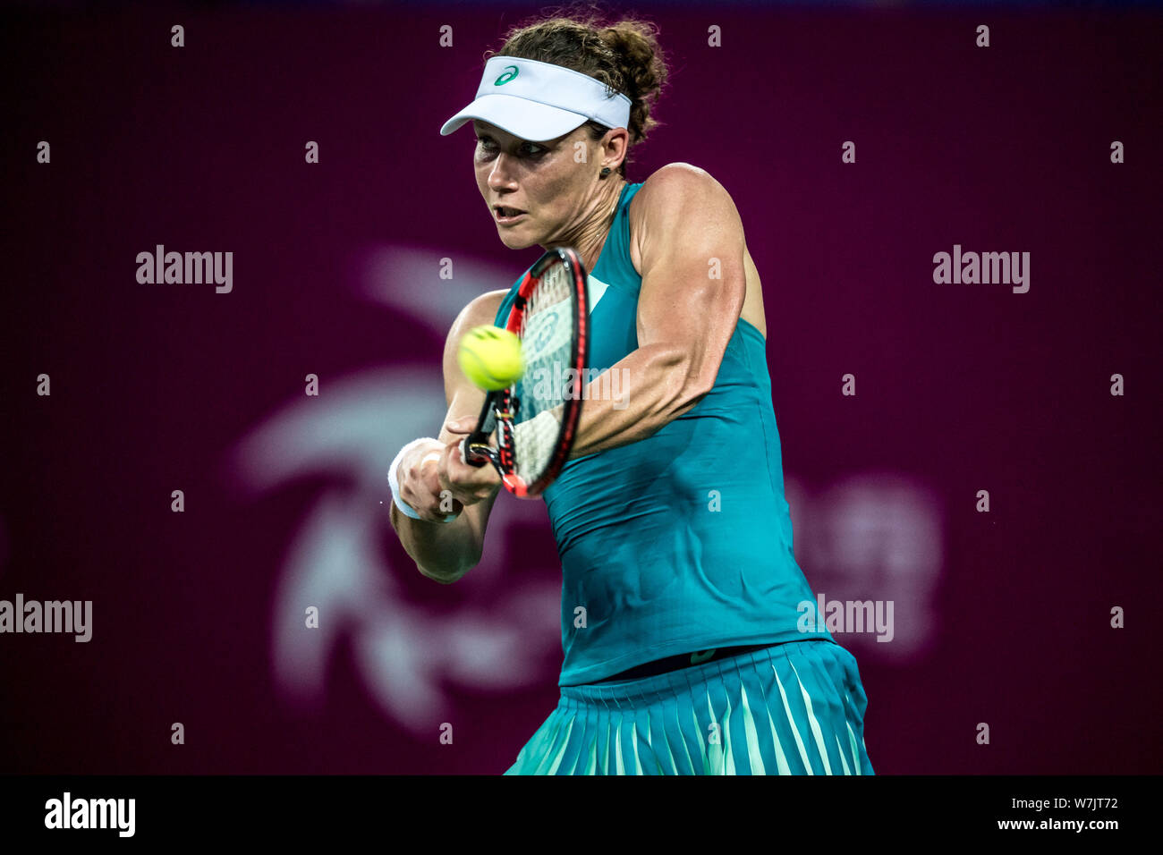 Samantha Stosur of Australia returns a shot to Han Xinyun of China in their first round match during the WTA Guangzhou International Women's Open 2017 Stock Photo