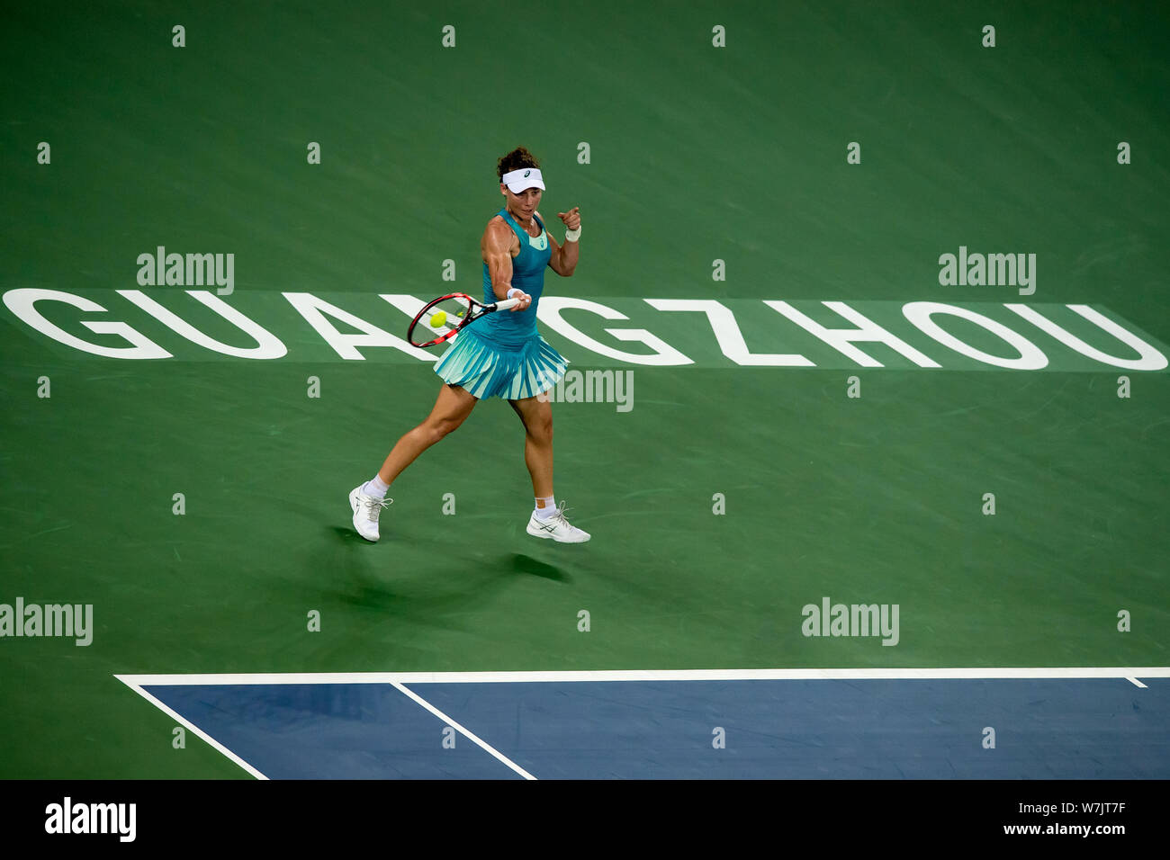 Samantha Stosur of Australia returns a shot to Han Xinyun of China in their first round match during the WTA Guangzhou International Women's Open 2017 Stock Photo