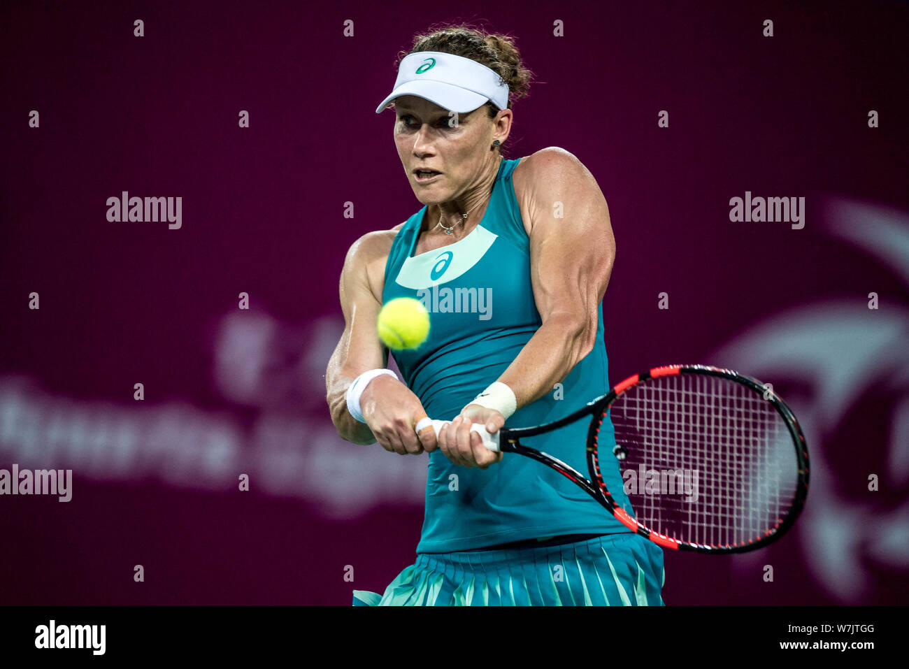 Samantha Stosur of Australia returns a shot to Han Xinyun of China in their first round match during the WTA Guangzhou International Women's Open 2017 Stock Photo