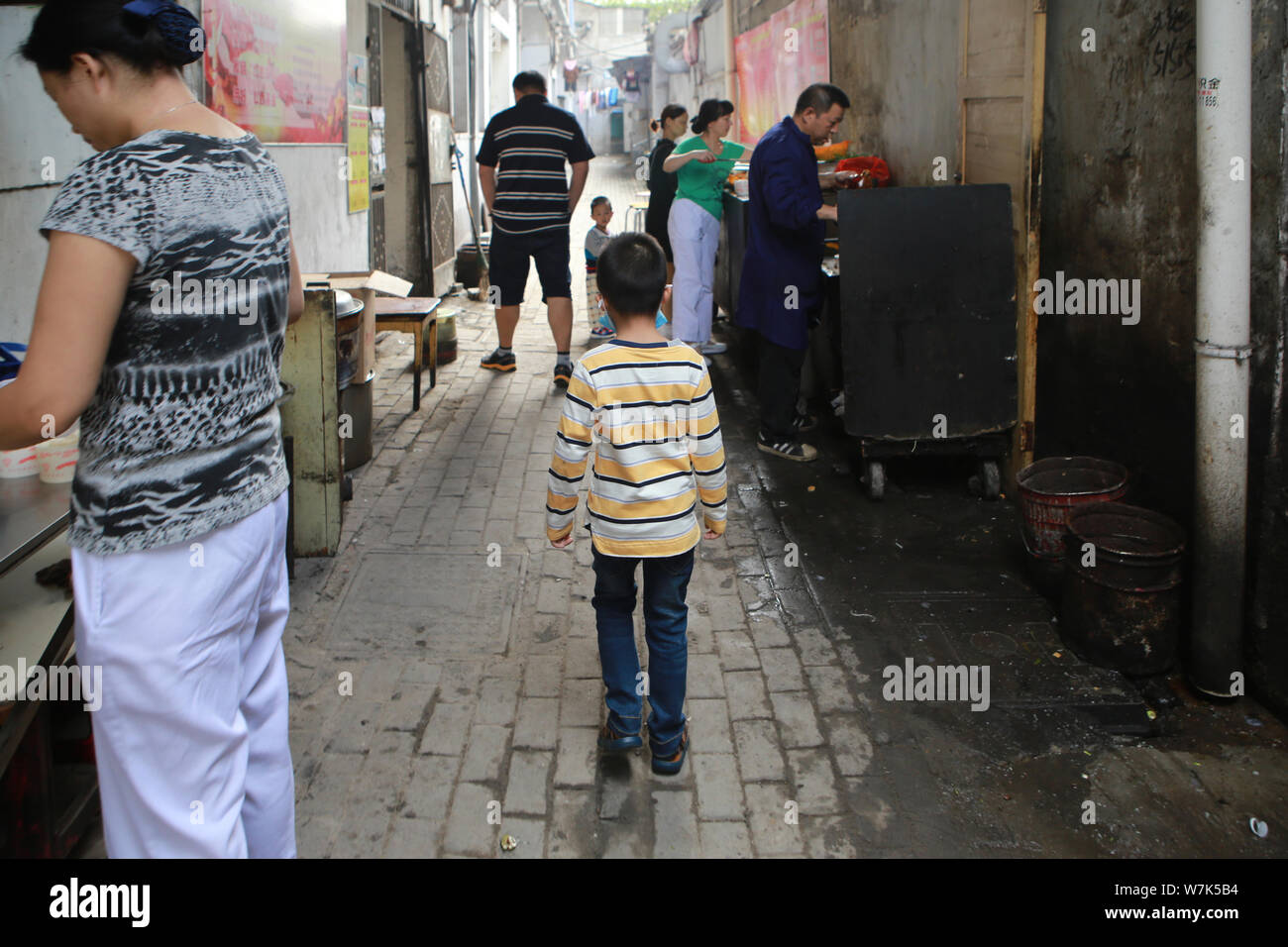 6yearold Chinese boy Xiao Zhi donating bone marrow to save his elder brother Xiao Jie is on