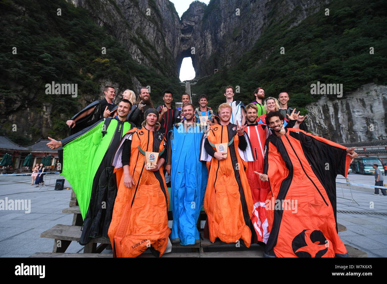 Wingsuit fliers pose for photos during the 2017 World Wingsuit League