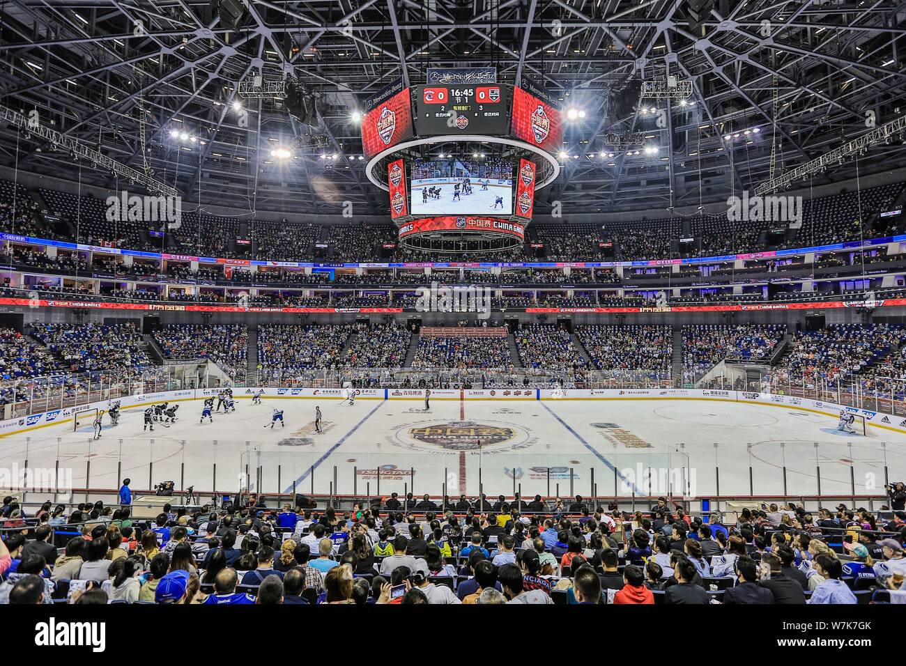 Spectators watch the 1st NHL China preseason hockey game between Los Angeles Kings and Vancouver Canucks at Mercedes-Benz Arena in Shanghai, China, 21 Stock Photo