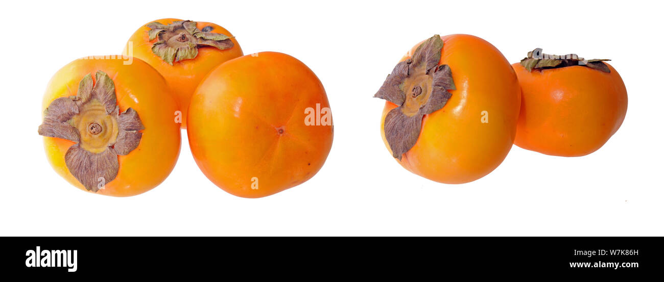 two groups of ripe persimmons isolate on white background Stock Photo