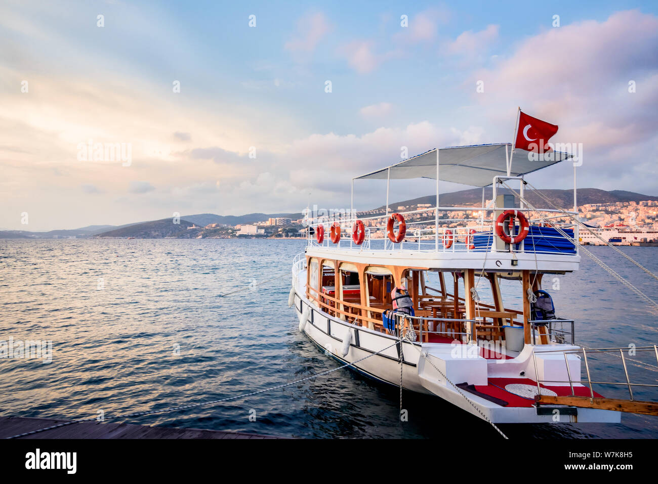 Tourist boat tied at Kusadasi port in Kusadasi, Turkey. Stock Photo
