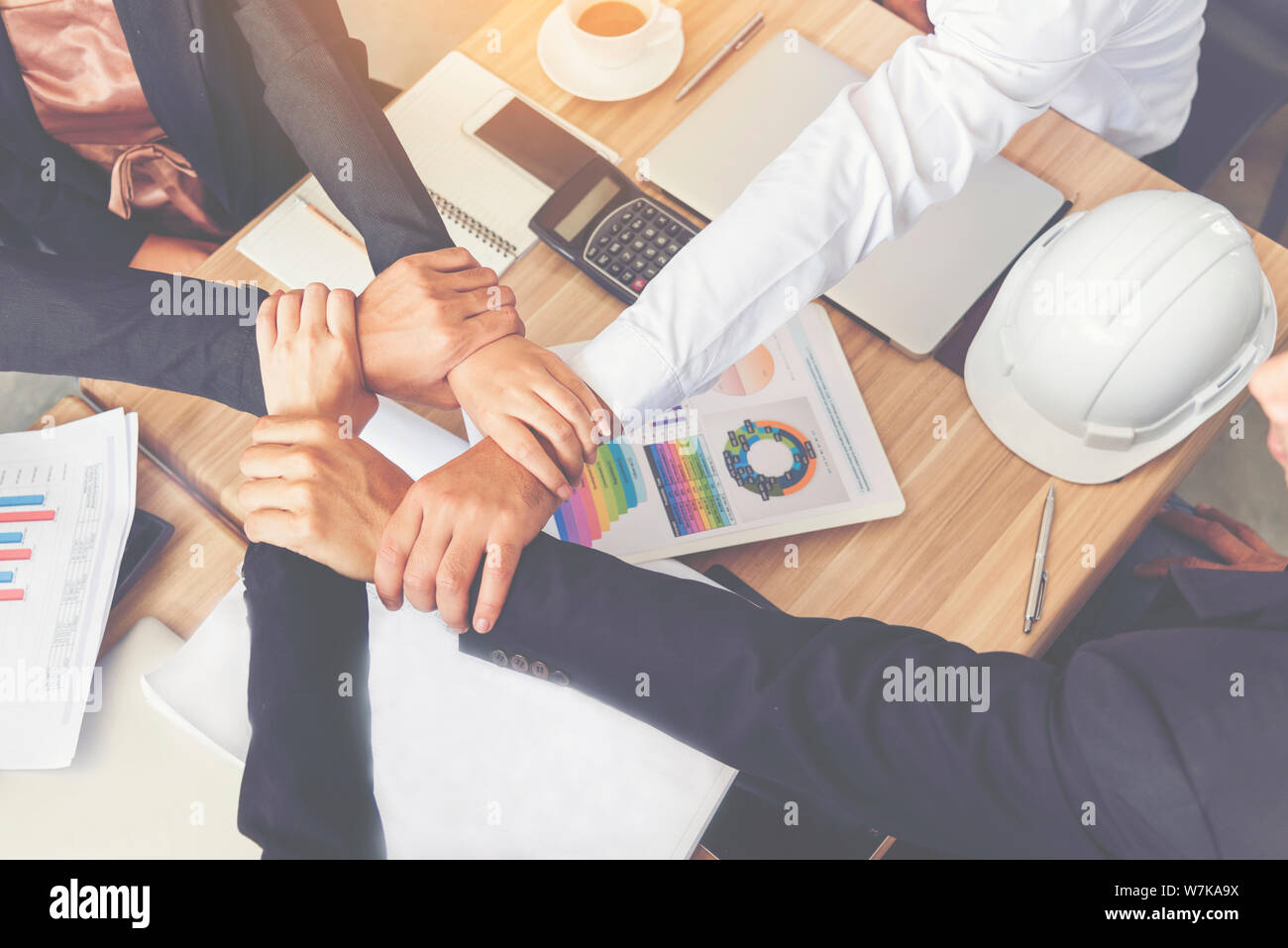 Businessman and engineer working  hands of business people join hand together. Stock Photo