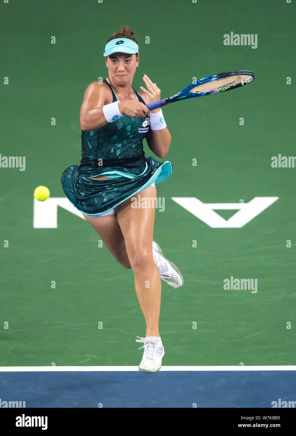 Danka Kovinic of Montenegro returns a shot to Alize Cornet of France in  their second round match during the WTA Guangzhou International Women's  Open 2 Stock Photo - Alamy