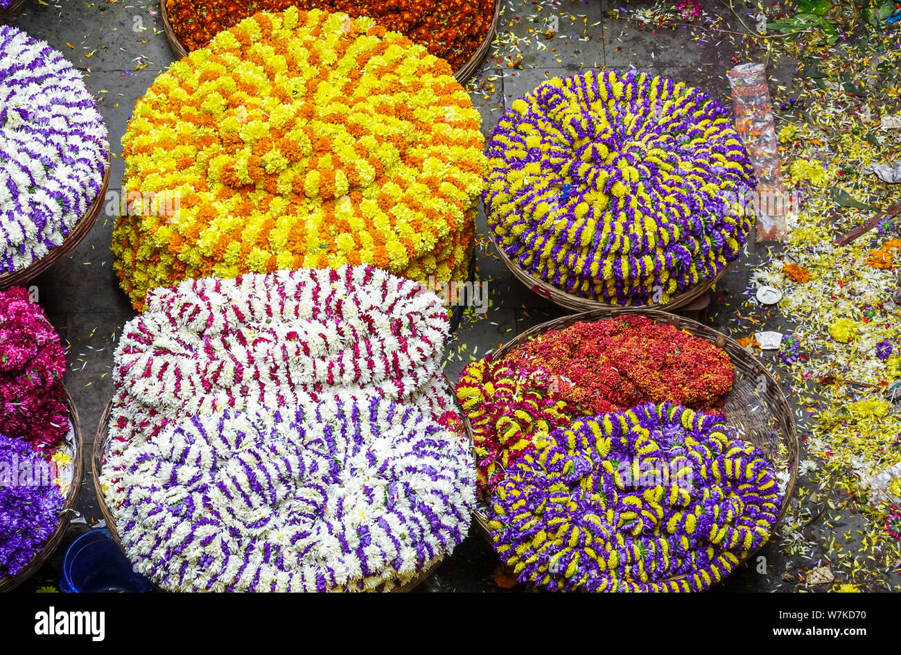 Fresh flowers sold in wholesale inside KR flower market Bangalore India which is one of the biggest flower markets in Asia Stock Photo