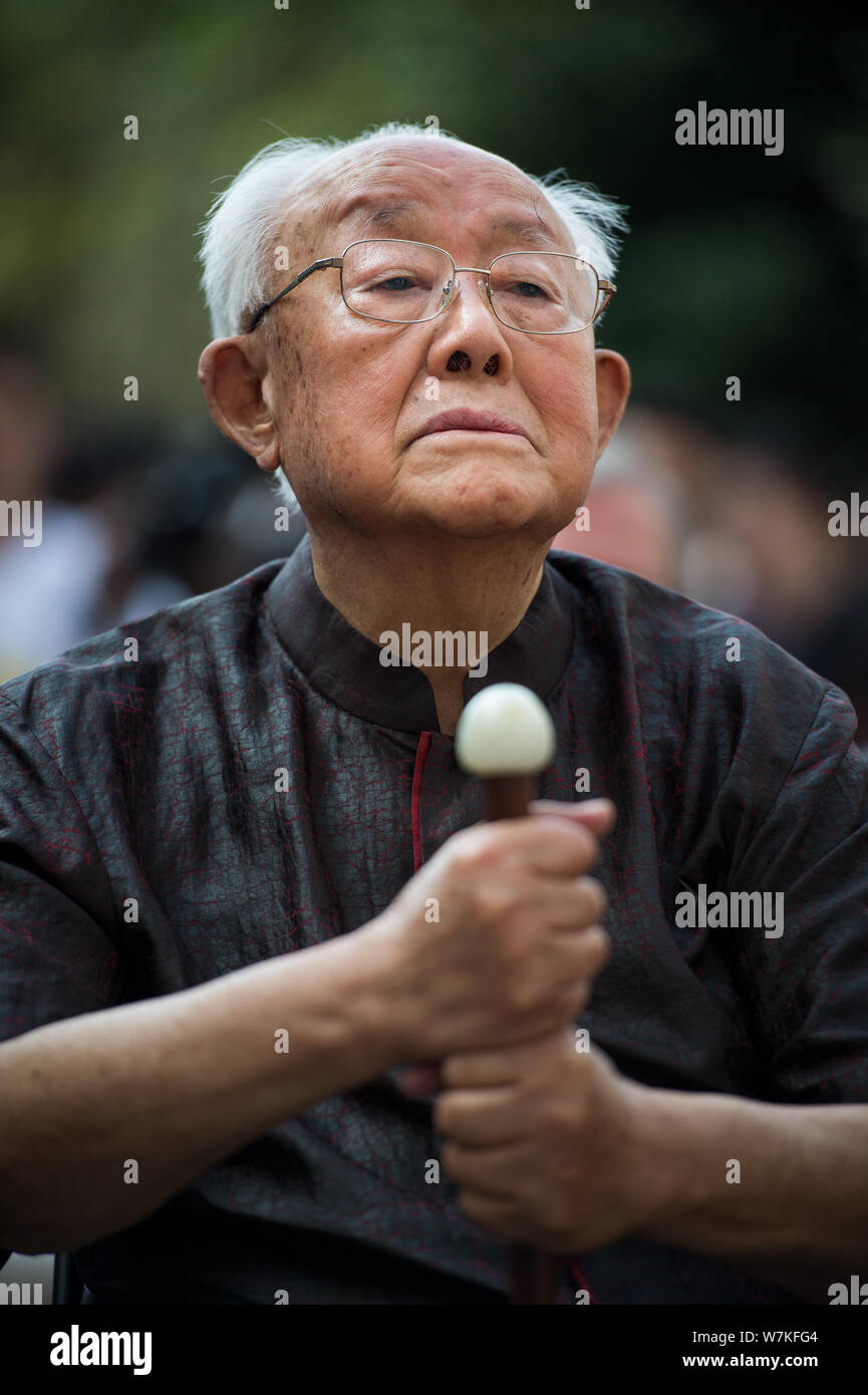 Chinese artist Zhou Shaohua attends the opening ceremony for the "The ...