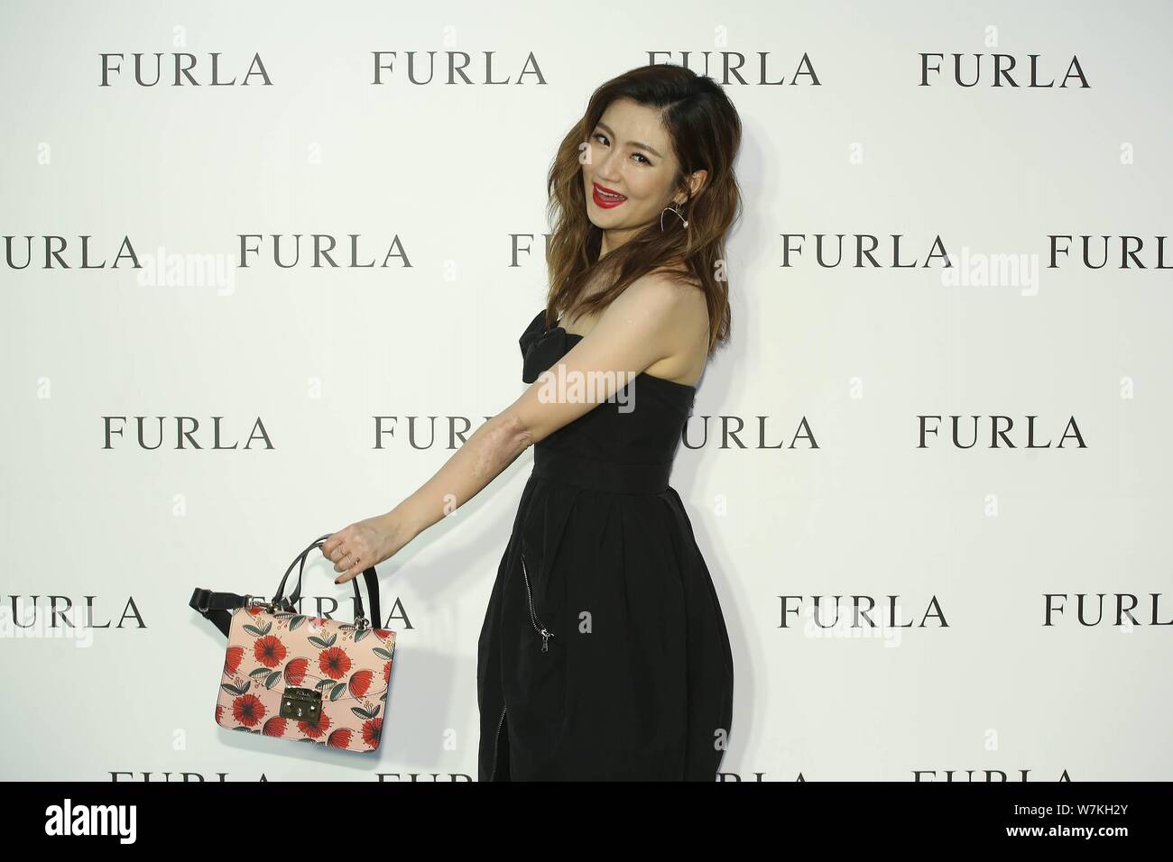 **TAIWAN OUT** Selina Jen Chia-hsuan of Taiwanese girl group S.H.E poses at a promotional event for Furla in Taipei, Taiwan, 28 August 2017. Stock Photo