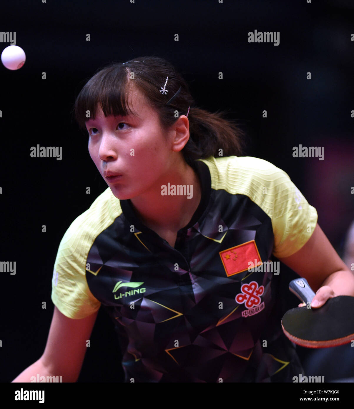 Qian Tianyi of China serves against Soma Yumeno of Japan in their Junior Girls Singles match during the 2017 ITTF World Junior Circuit Hong Kong Junio Stock Photo
