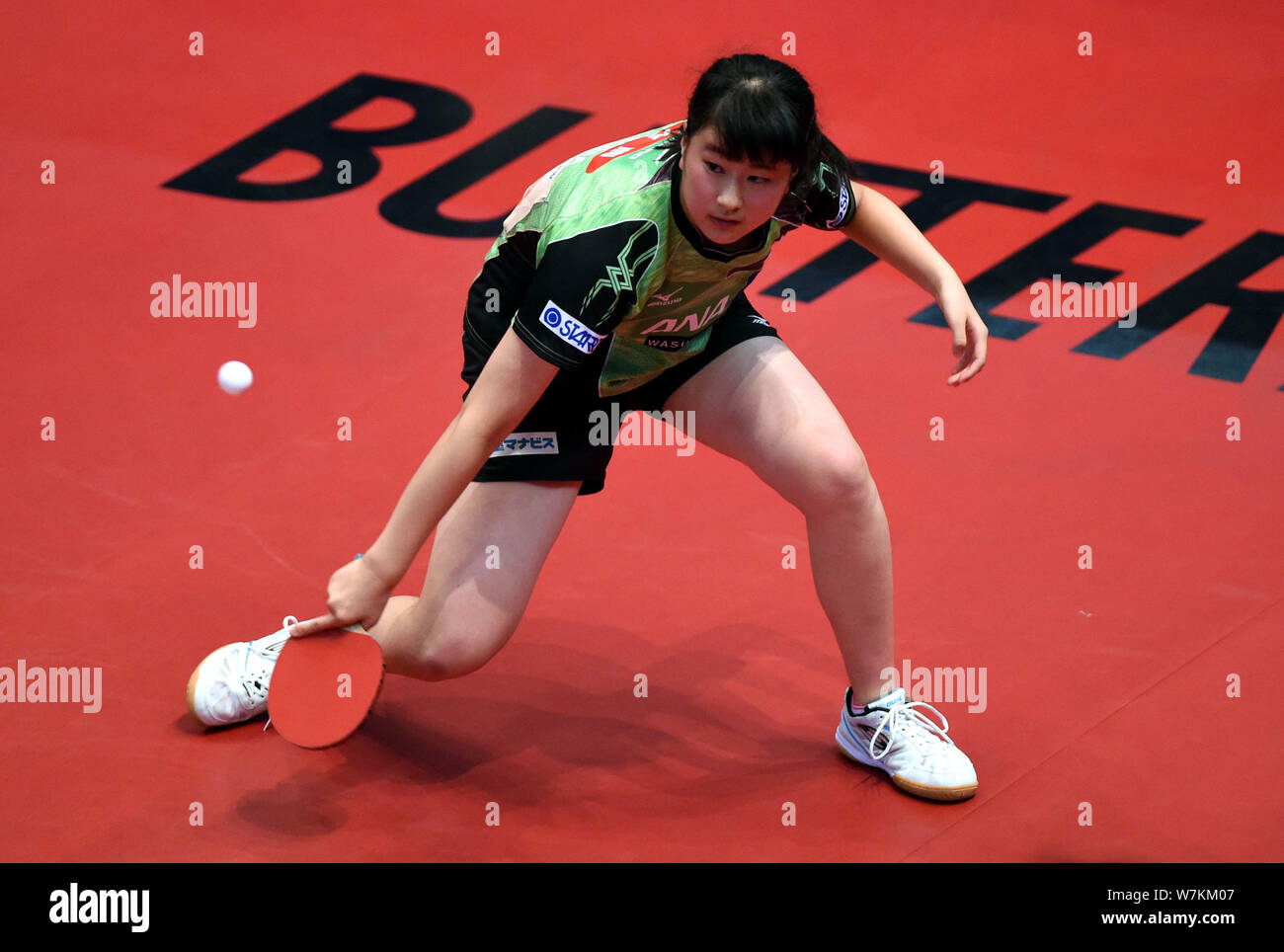 Soma Yumeno of Japan returns a shot to Qian Tianyi of China in their Junior Girls Singles match during the 2017 ITTF World Junior Circuit Hong Kong Ju Stock Photo