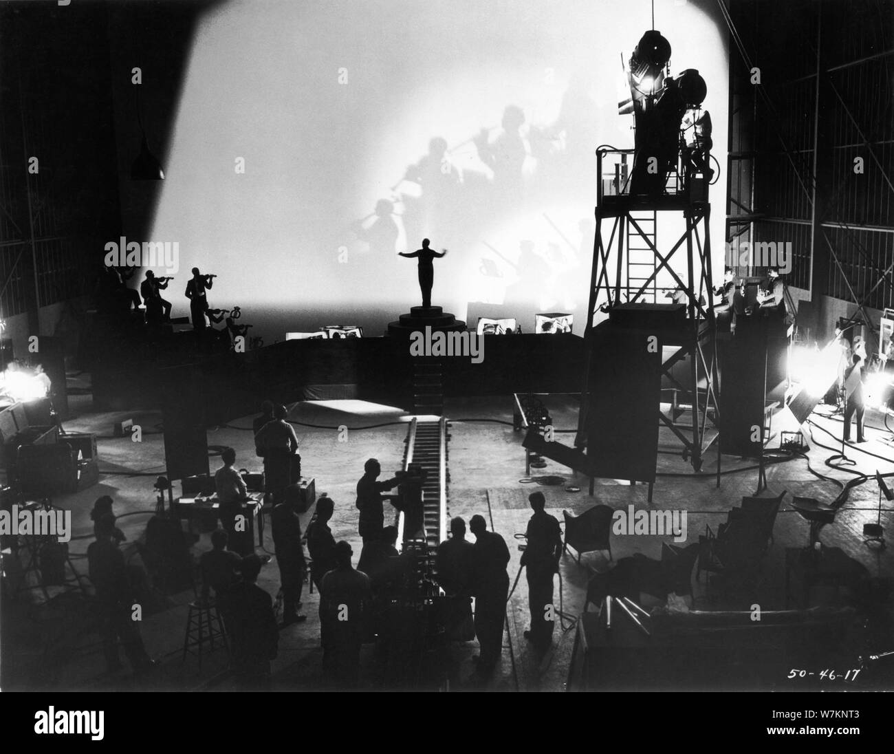 WALT DISNEY FANTASIA 1940 on set candid filming orchestra conducted by Leopold STOKOWSKI live action cinematography by JAMES WONG HOWE Animated Feature Film Walt Disney Productions / RKO Radio Pictures Stock Photo