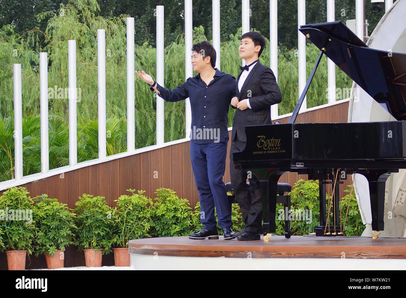 Chinese pianist Lang Lang attends the unveiling ceremony for the piano square named after him in