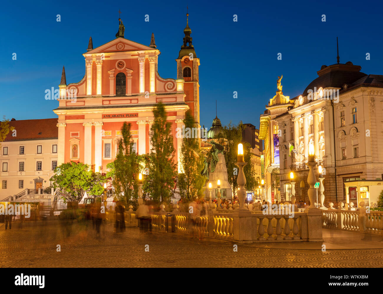 The Pink Franciscan Church and the triple bridge Tromostovje at night  Ljubljana Slovenia EU Europe Stock Photo