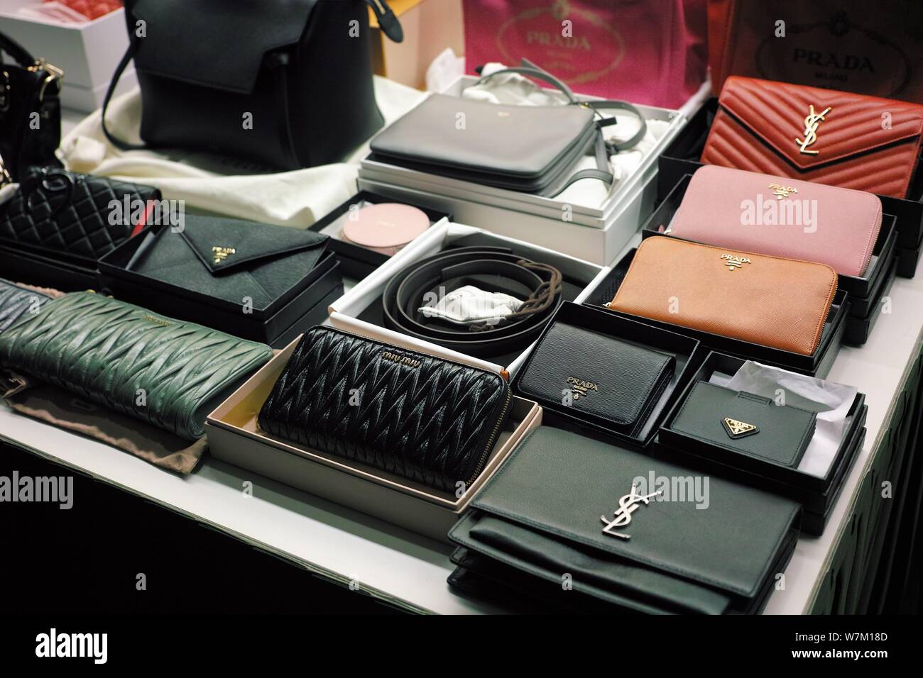 View of the fake luxury products sold by two Chinese women to customers in mainland China on display at a police station in Macau, China, 17 August 20 Stock Photo