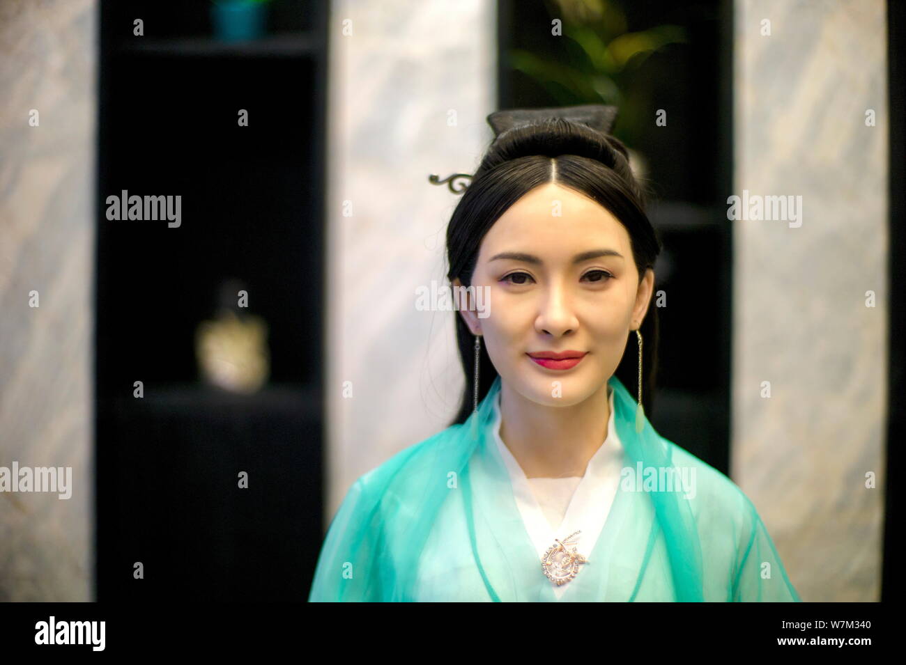 View of a wax figure of Chinese actress Yang Mi dressed as Bai Qian, a High  Goddess in the fantasy romance ''Ten Miles of Peach Blossom'' at a hot-pot  Stock Photo -