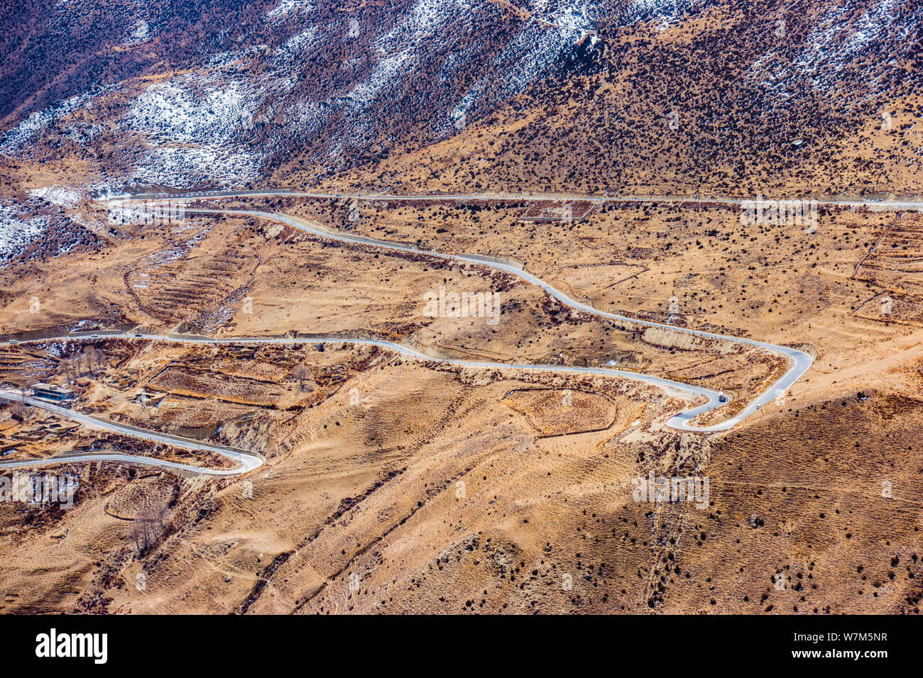 Aerial view of the 'Nujiang 72 Turns', a section of winding road with 72 curves along the Sichuan-Tibet Highway near the Nujiang River in Basu (Baxoi) Stock Photo