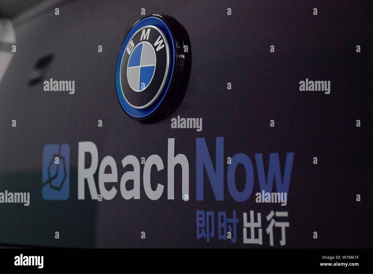 View of a logo of BMW¯s ReachNow car-sharing service at the dedicated parking lot in Beijing, China, 19 August 2017.   BMW has launched a new car-shar Stock Photo