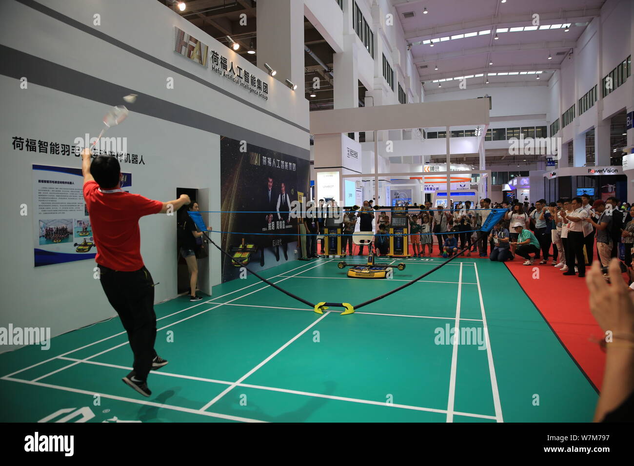 HFAI, a robot of Shanghai Hefu Holding (Group) Company Limited, plays  badminton with a human at the 2017 World Robot Conference at Beijing  Yichuang In Stock Photo - Alamy