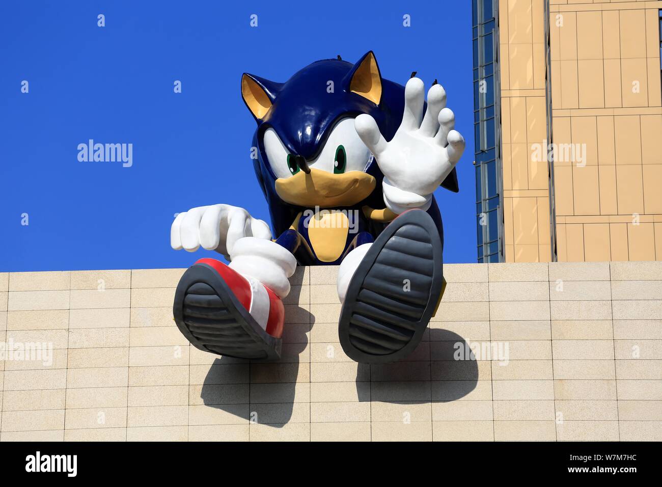 View of a sculpture of Sonic the Hedgehog, title character and protagonist  of the Sonic the Hedgehog series released by Sega, on the roof of the MixC  Stock Photo - Alamy