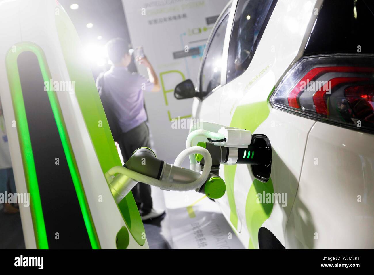 An EV of EVCard electric car sharing service is being charged by