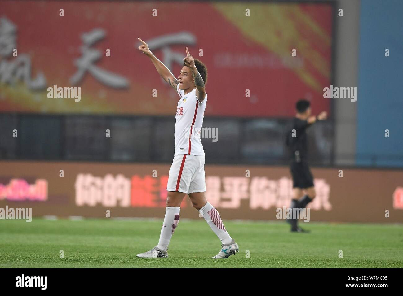 Belgian football player Axel Witsel of Tianjin Quanjian celebrates after scoring a goal against Guangzhou R&F in their 16th round match during the 201 Stock Photo