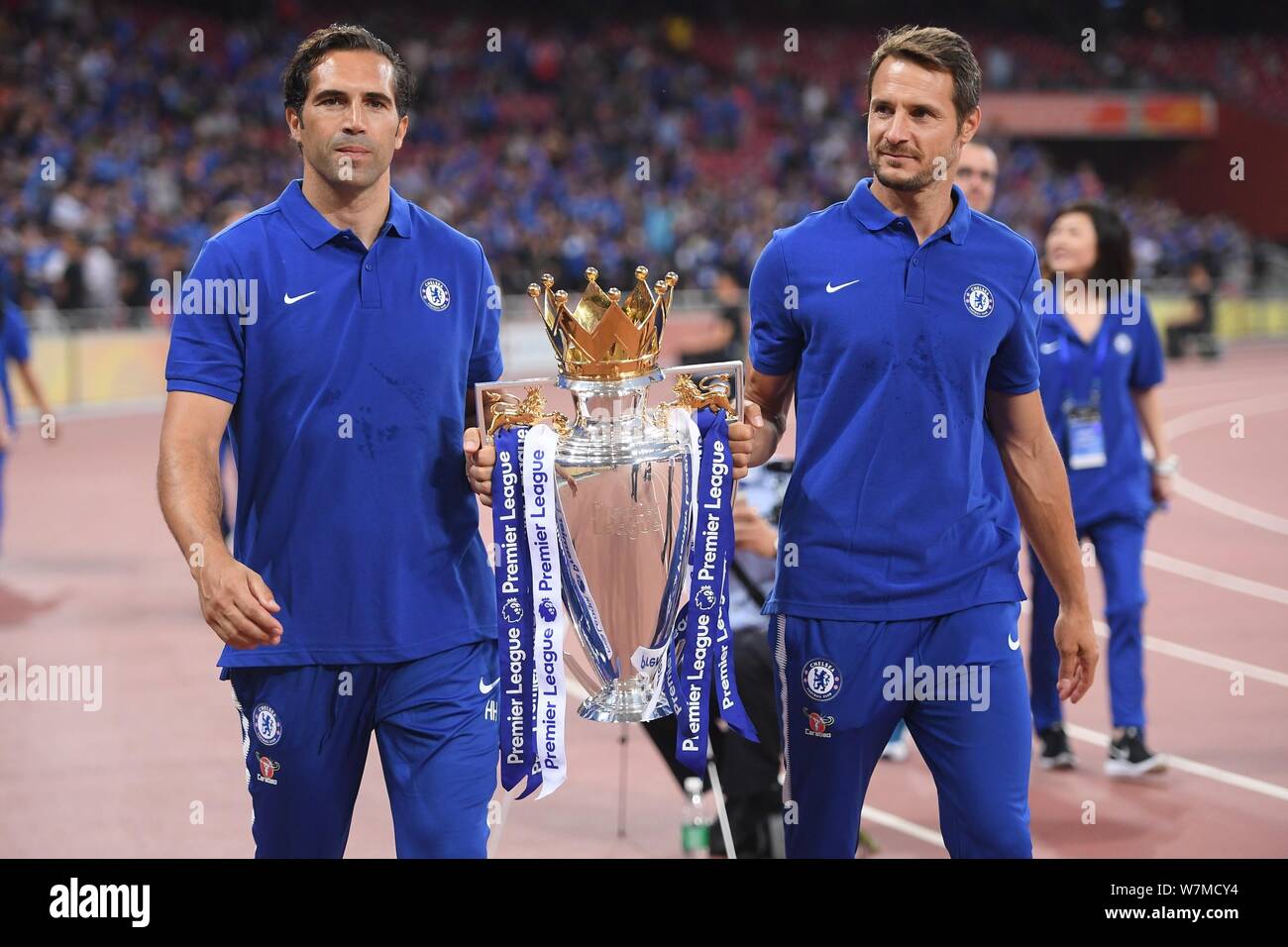 Players Of Chelsea F C Hold The Trophy Before The Bird S Nest London Derby Against Arsenal F C At The Beijing National Stadium Also Known As The Bi Stock Photo Alamy