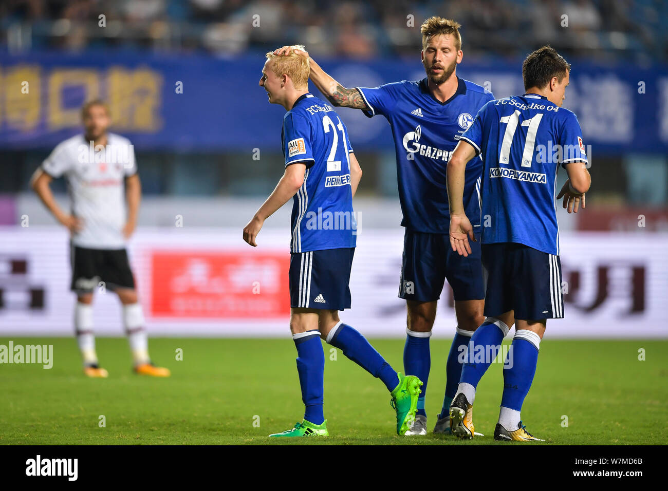 Players of FC Schalke 04 celebrate after scoring a goal against Besiktas  J.K. in a friendly soccer match in Zhuhai city, south China's Guangdong  provi Stock Photo - Alamy