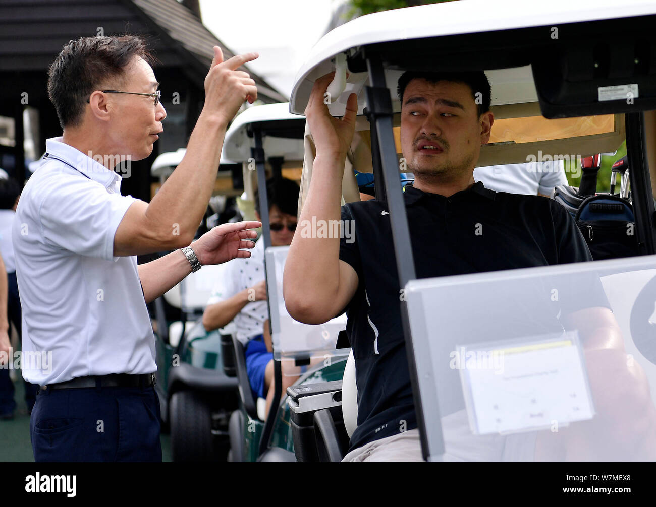 Retired Chinese basketball star Yao Ming, chairman of the Chinese Basketball Association (CBA), is pictured in a buggy during the 2017 Yao Foundation Stock Photo
