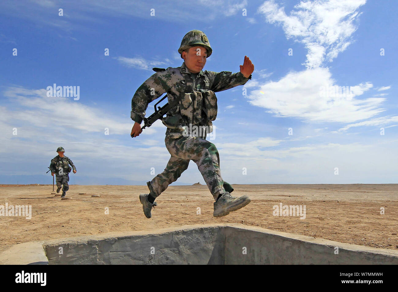 A Chinese soldier of the PLA (People's Liberation Army) takes part in a