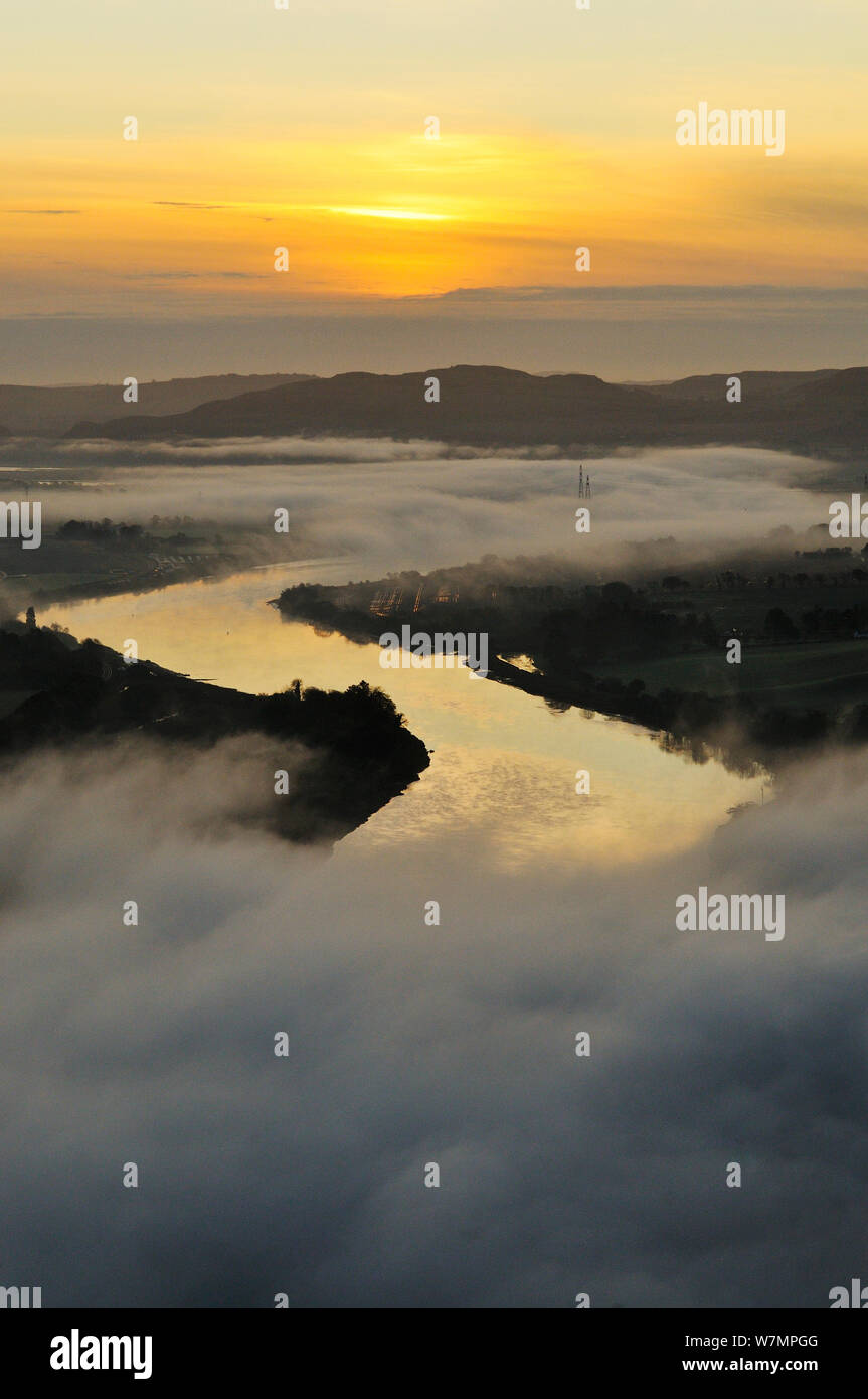 A misty morning viewlooking down the River Tay in autumn, Kinnoull Hill Woodland Park, Perthshire, Scotland, November 2011. Stock Photo