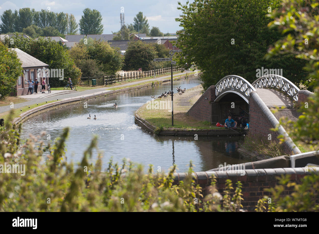People fishing in canals near Bumble Hole Nature Reserve, Sandwell, West Midlands, July 2011 Stock Photo