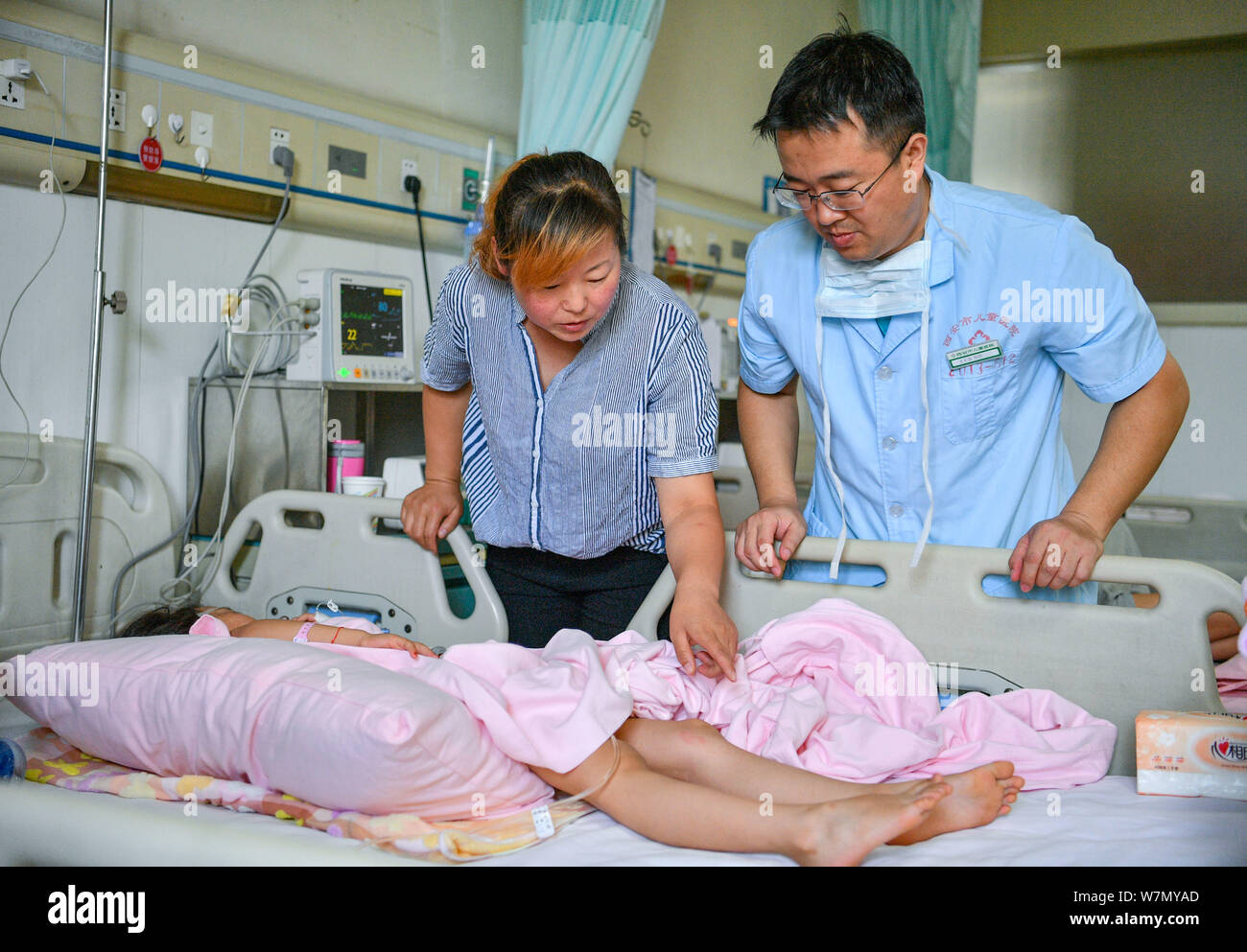 The five-year-old girl Lele is undergoing therapy after doing a simple  backbend which left her paralyzed from the waist down at a hospital in  Yulin ci Stock Photo - Alamy