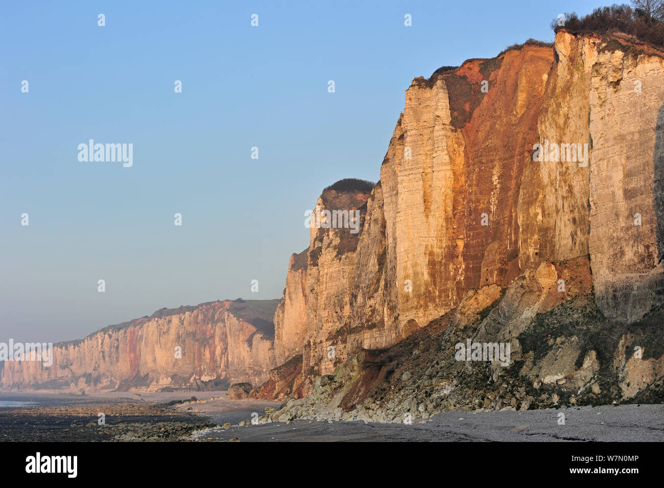 Crumbling chalk cliffs and pebble beach at Yport, Côte d'Albâtre, Upper Normandy, France, March Stock Photo