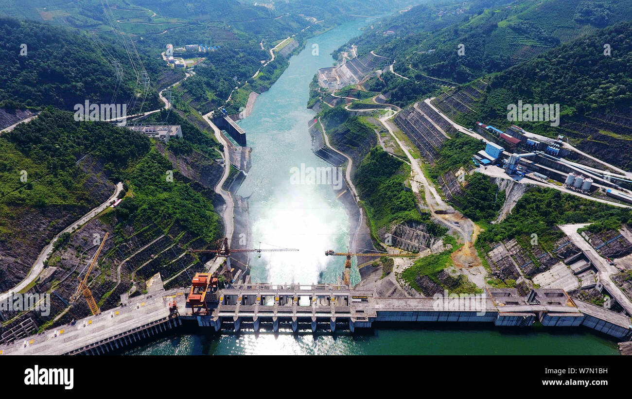 View of the Longtan hydropower station releasing water for the need of  flood control along the Longtan Dam in Tian'e county, Hechi city, south  China's Stock Photo - Alamy