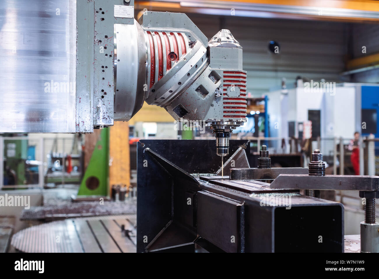 Milling machine robot working on workpiece Stock Photo