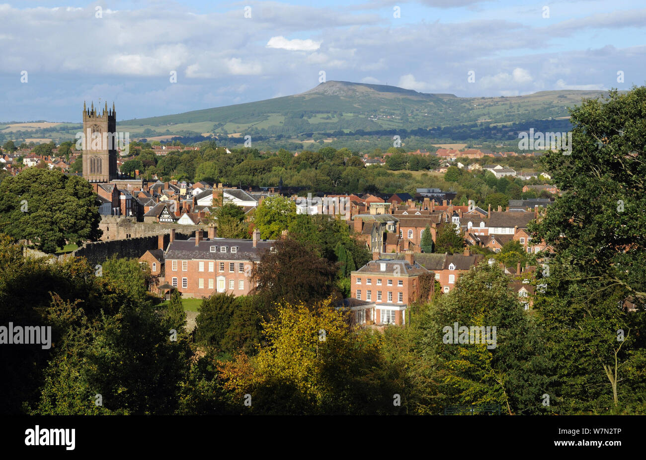 View over Ludlow with St. Laurence church and Titterstone Clee Hill in background, Shropshire, England, UK, August 2011 Stock Photo