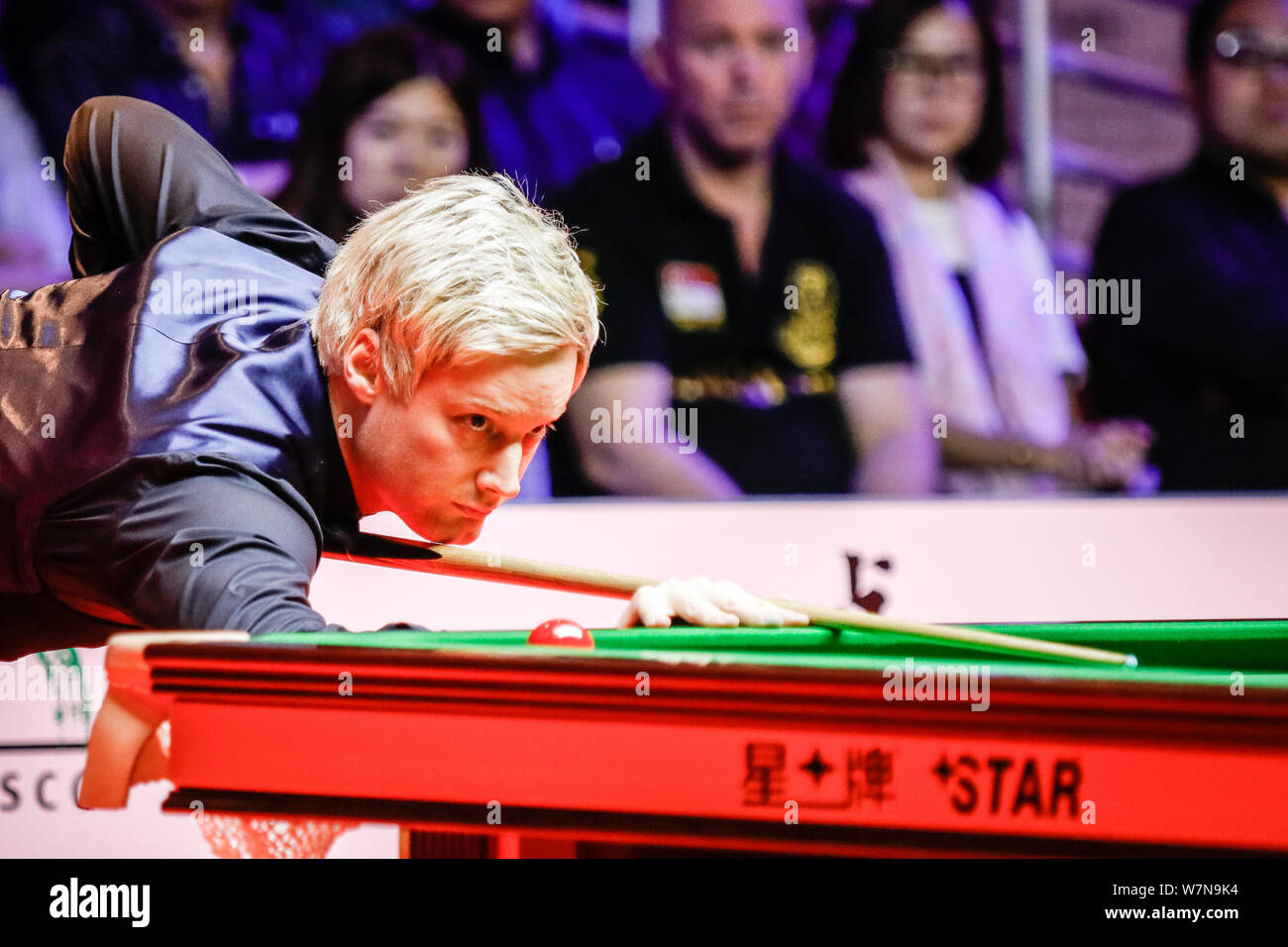 Neil Robertson of Australia plays a shot to Ronnie OSullivan of England in the final match during the World Snooker Hong Kong Masters 2017 in Hong Ko Stock Photo