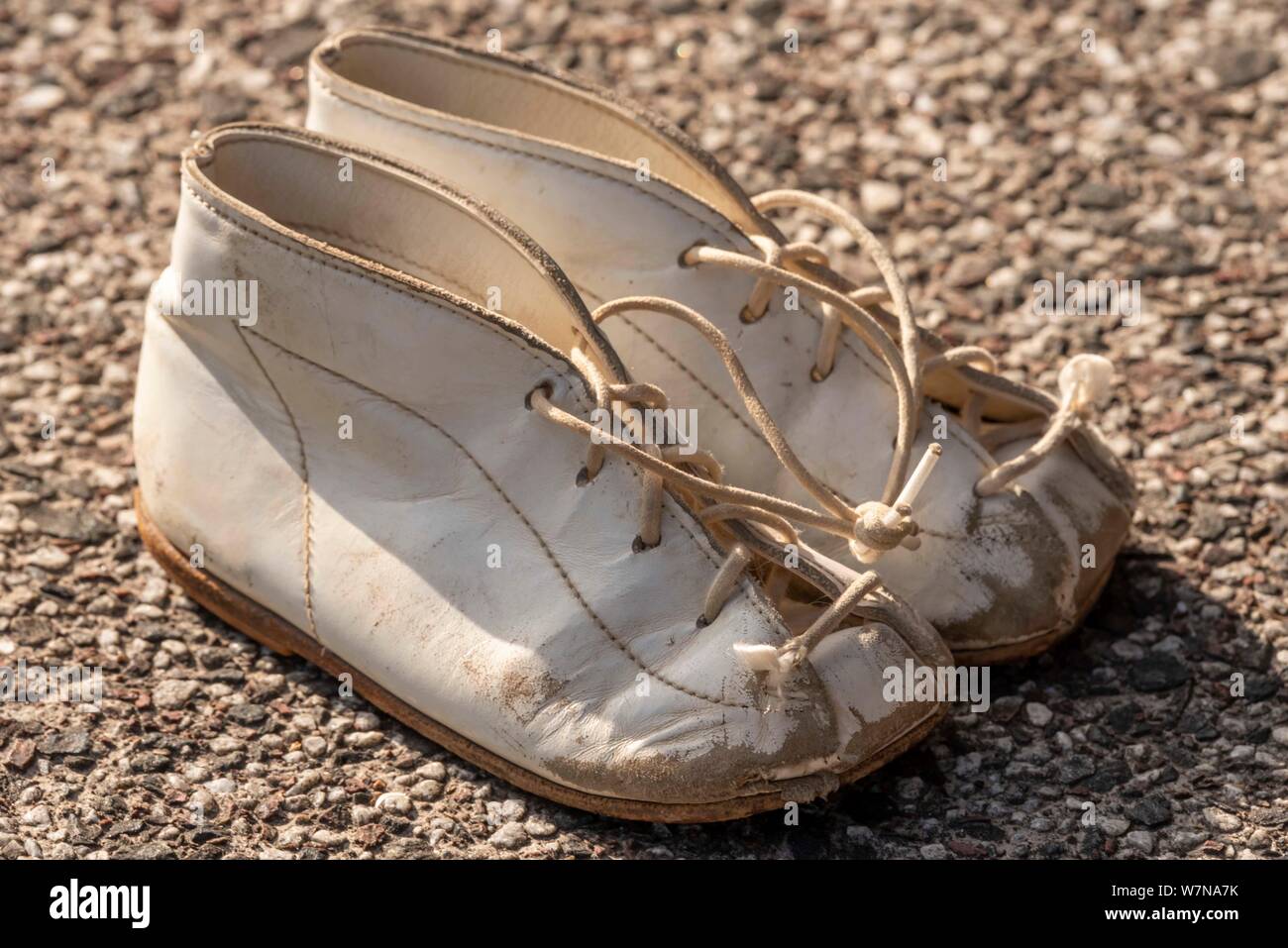 Old baby shoes for toddler Stock Photo Alamy