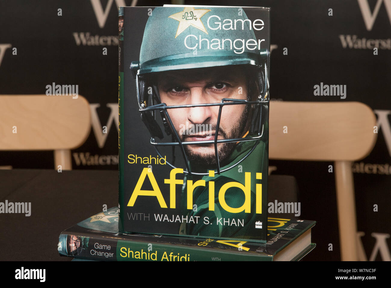 Former Pakistan Cricket Captain, Shahid Afridi, signs copies of his new