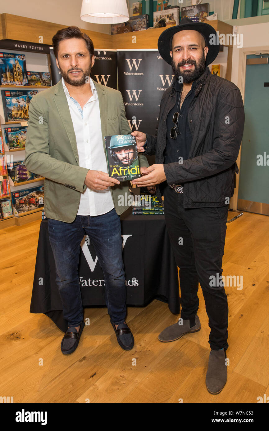 Former Pakistan Cricket Captain, Shahid Afridi, signs copies of his new