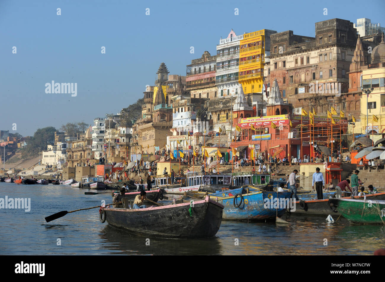 View along the ghats next to Ganges river, Vanarasi / Benares, India, February 2012 Stock Photo